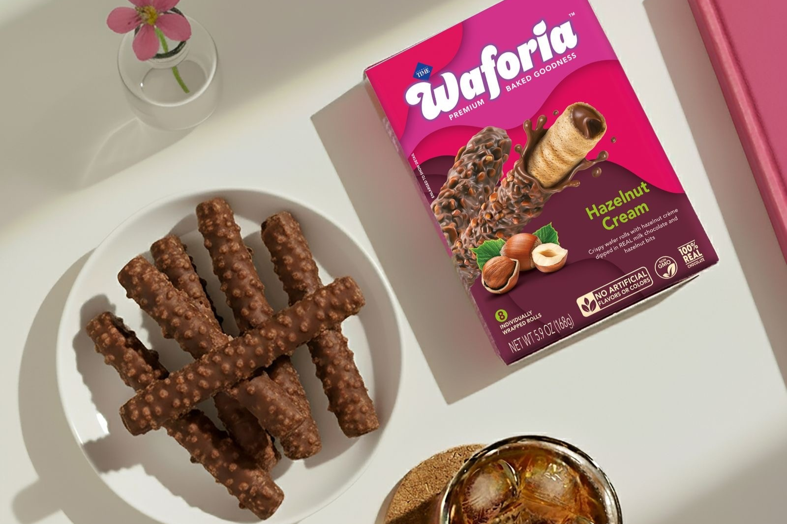 Waferia Hazelnut Cream cookies on a plate with packaging in the background